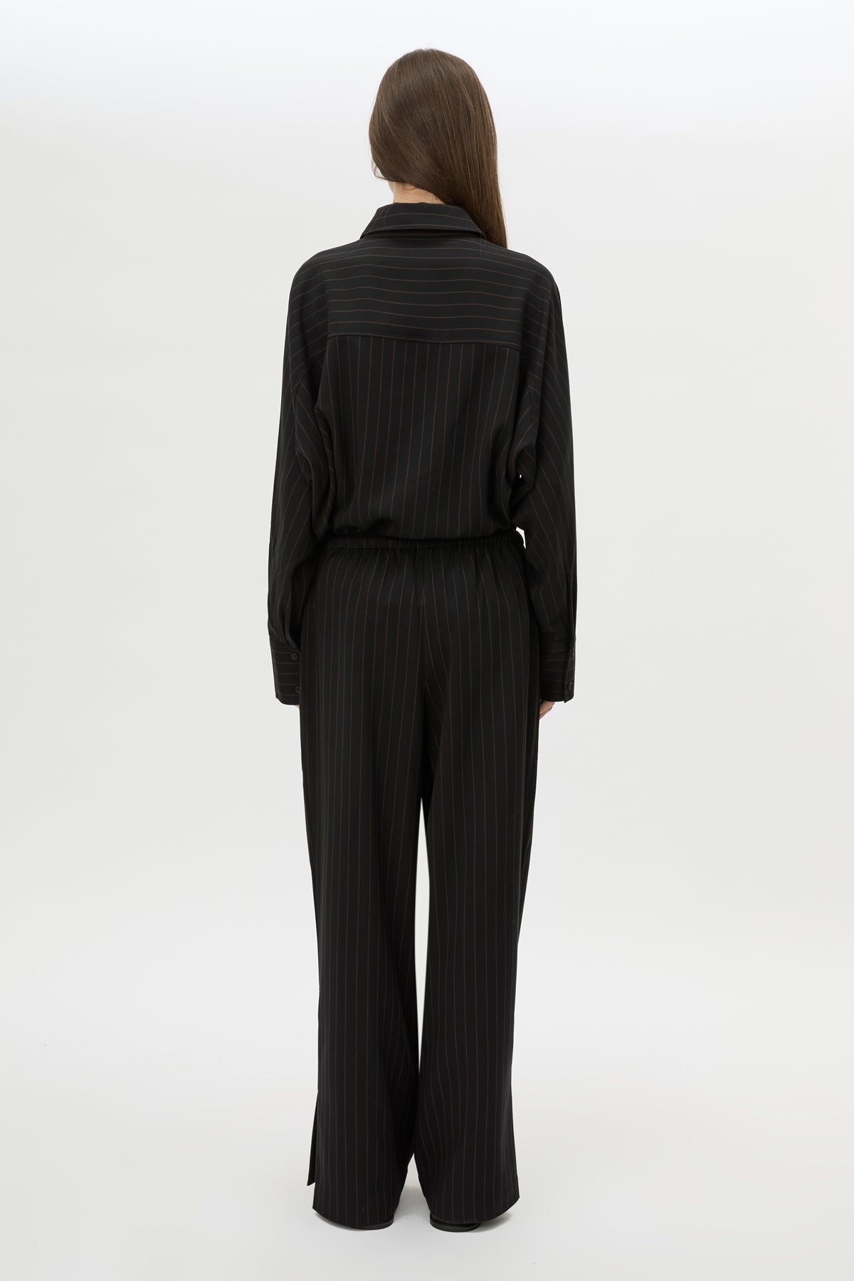 Back view CAMILLA AND MARC Sedona Stripe Pant in Black Stripe with relaxed fit and adjustable waistband.