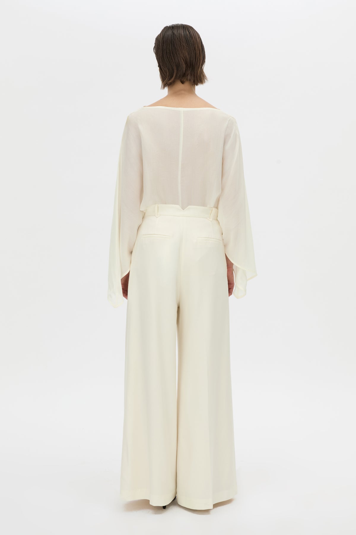 Styled view CAMILLA AND MARC high-waisted Selin Suit Pant in cream.