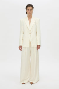 Front-styled-2 view CAMILLA AND MARC high-waisted Selin Suit Pant in cream.