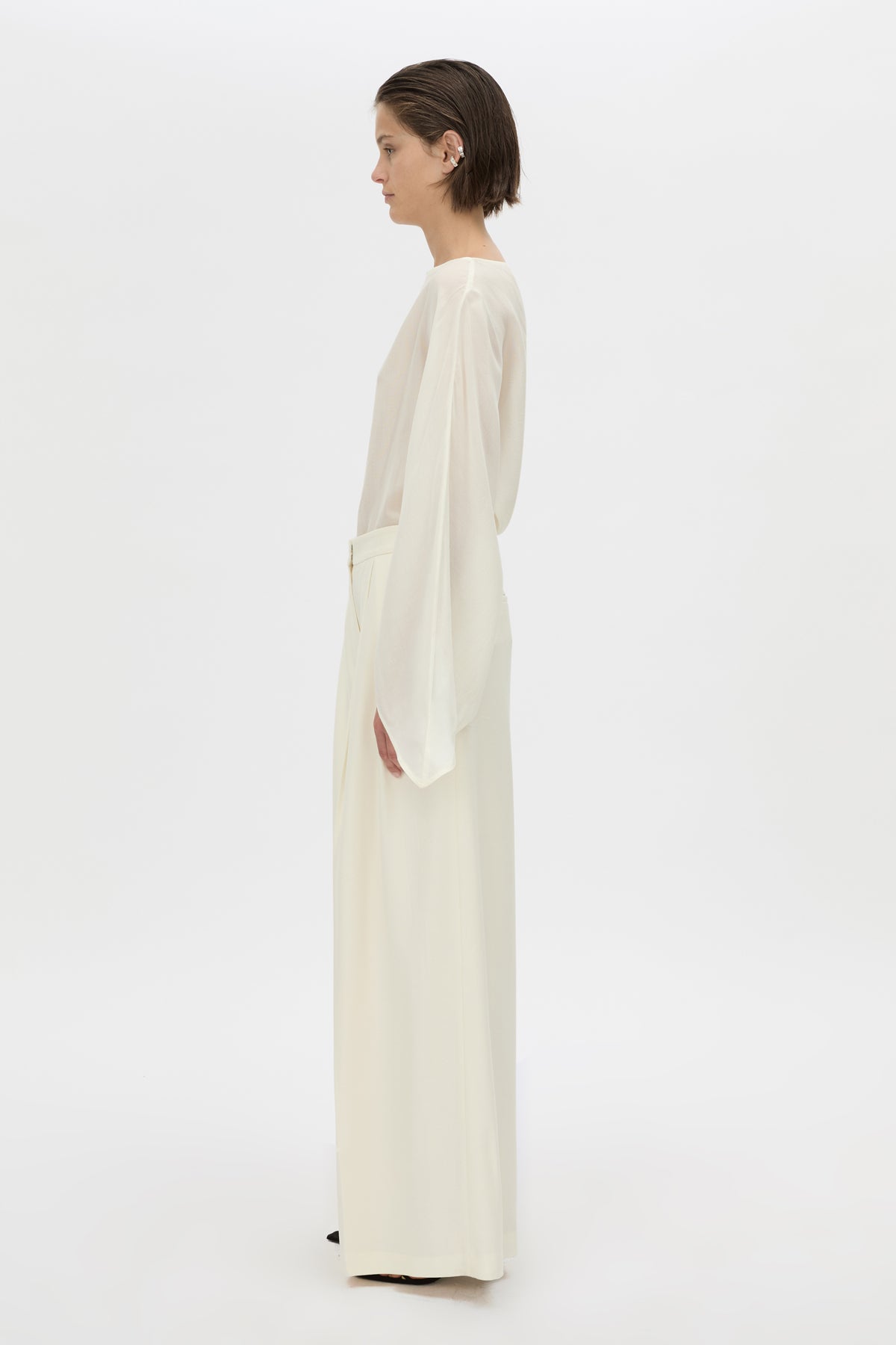 Styled view CAMILLA AND MARC high-waisted Selin Suit Pant in cream.