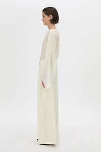 Styled view CAMILLA AND MARC high-waisted Selin Suit Pant in cream.