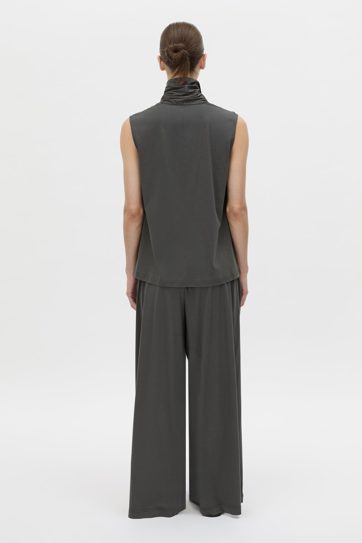 Back view CAMILLA AND MARC Senae Draped Knot Sleeveless Top in charcoal grey.