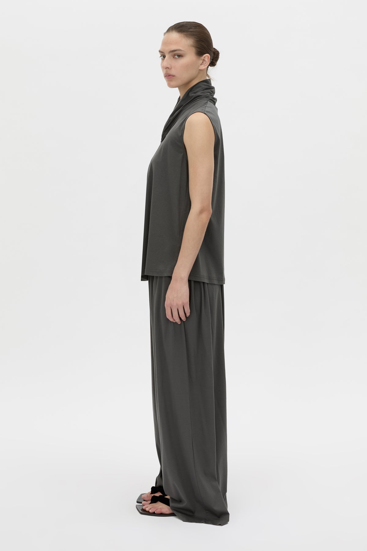 Side view CAMILLA AND MARC Senae Draped Knot Sleeveless Top in charcoal grey.