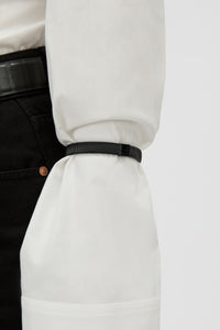 Close up View - CAMILLA AND MARC Sleeve Monogram garter pair in black. Worn on the arm to perfectly bunch up 