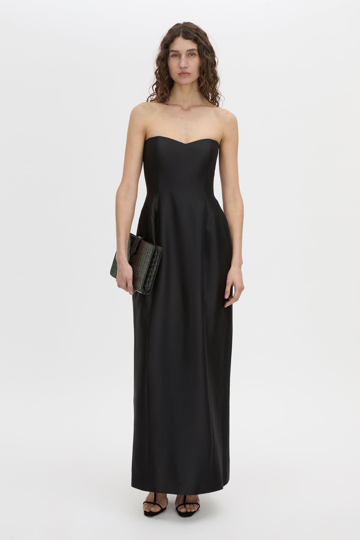Front-styled view CAMILLA AND MARC strapless Sona Maxi Dress in black with structured internal bodice.