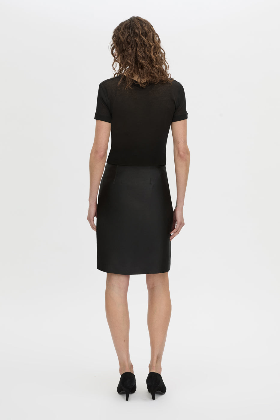 Back view CAMILLA AND MARC Sona Pencil Skirt in black with knee‑length hem.