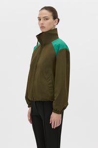 Cropped view CAMILLA AND MARC Storm Colour Block Anorak in khaki emerald with contrast shoulder panels and a funnel neckline.