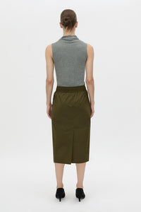 Back view CAMILLA AND MARC Storm Midi Skirt in khaki with an elasticated waistband, slanted side pockets and a back vent.