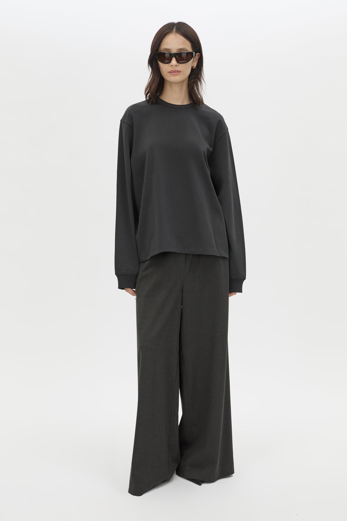 Front view CAMILLA AND MARC Studio Graphic Long Sleeve Top in Grey with boucle embroidered monogram.  