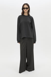 Front view CAMILLA AND MARC Studio Graphic Long Sleeve Top in Grey with boucle embroidered monogram.  