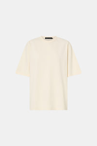 Ghost view CAMILLA AND MARC Studio Graphic Tee in White with short sleeves and boucle embroidered monogram.  