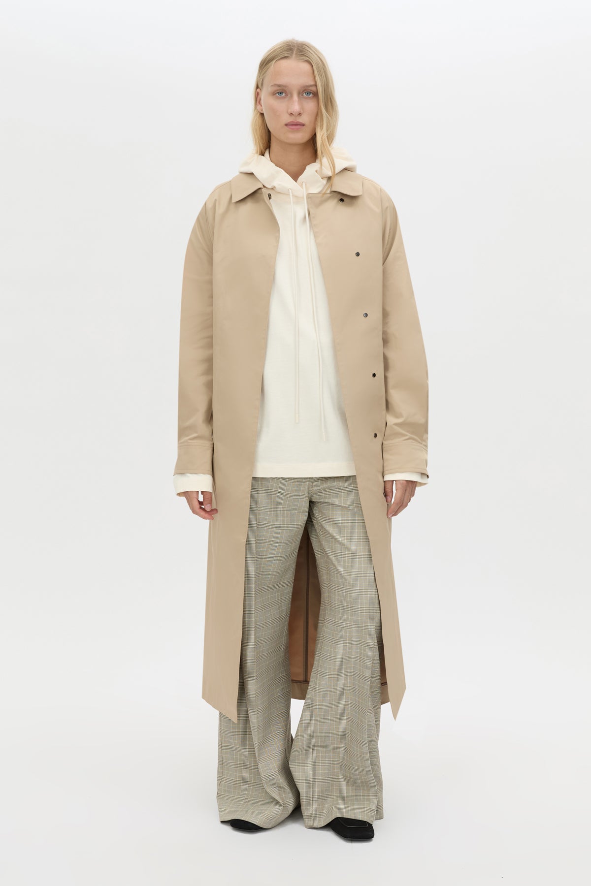 Front view CAMILLA AND MARC Studio Hoodie in White styled with the Mahdavi Trench.