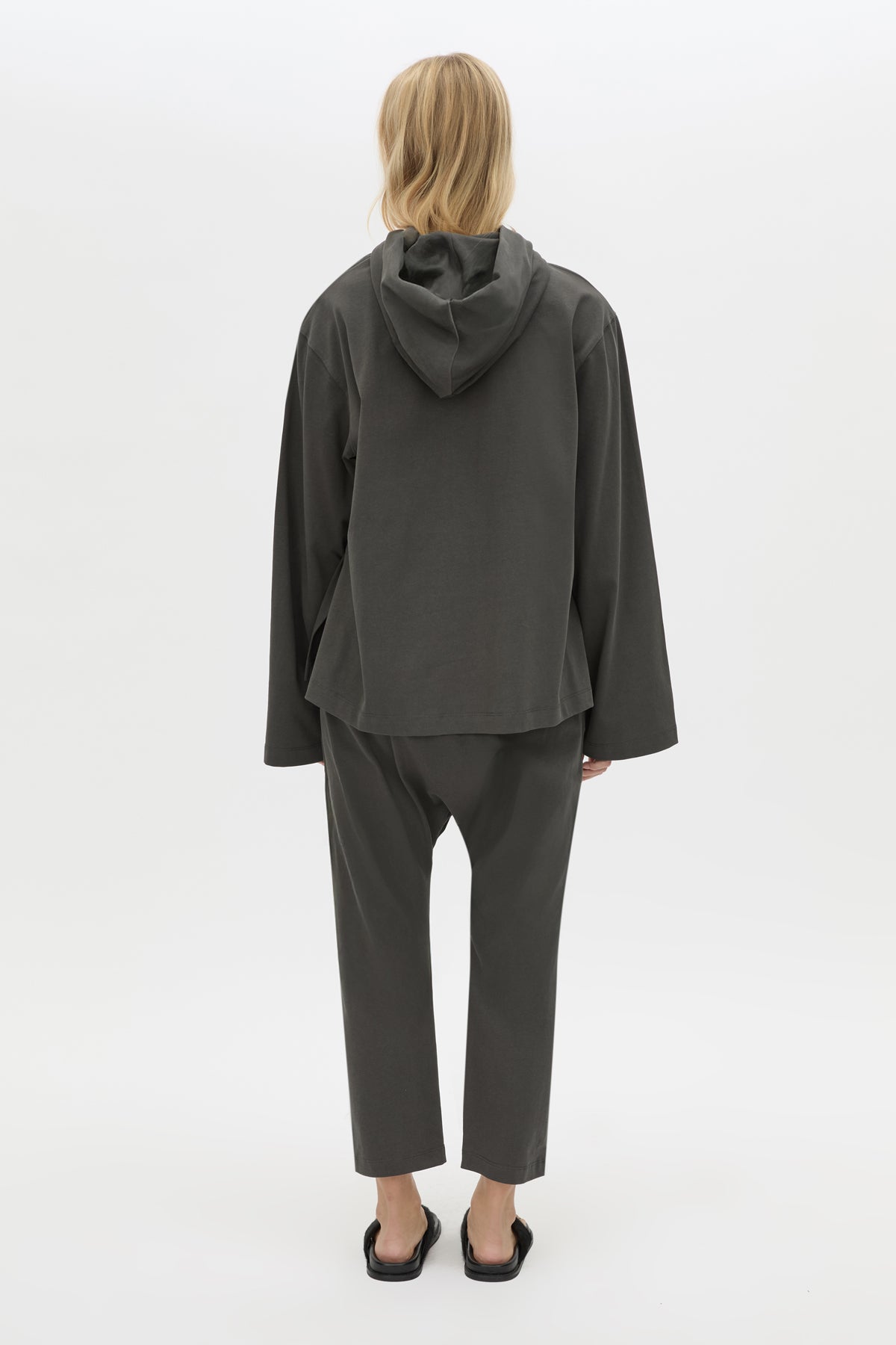 Back view CAMILLA AND MARC Studio Hoodie in Coal with relaxed long‑sleeve design and hooded silhouette.  