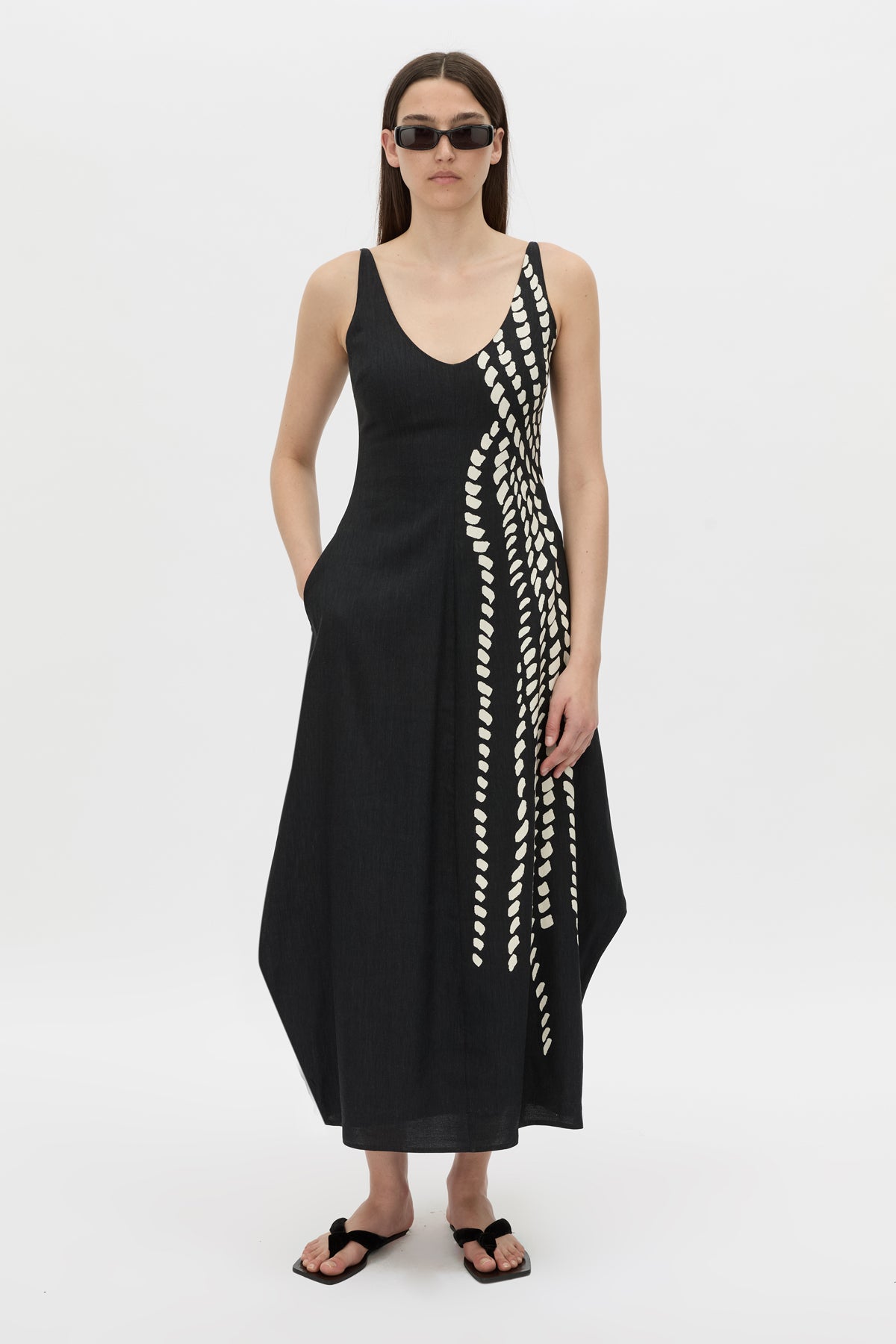 Front-styled view CAMILLA AND MARC Suri Midi Dress in black Suri print with a scooped neckline.