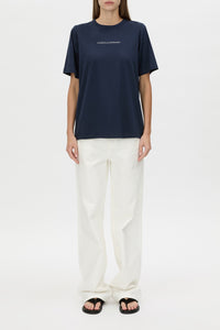Suvero Logo Tee - CAMILLA AND MARC Suvero relaxed printed navy cotton t-shirt with a centre front contrast logo