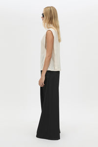 Side view CAMILLA AND MARC Talo Jersey Top in Cream with a boxy sleeveless cut.