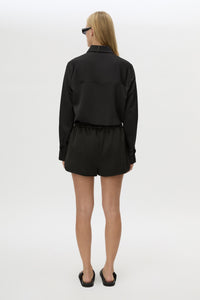 Back view CAMILLA AND MARC Tamar Mini Short in Black with relaxed fit and elasticated waistband.
