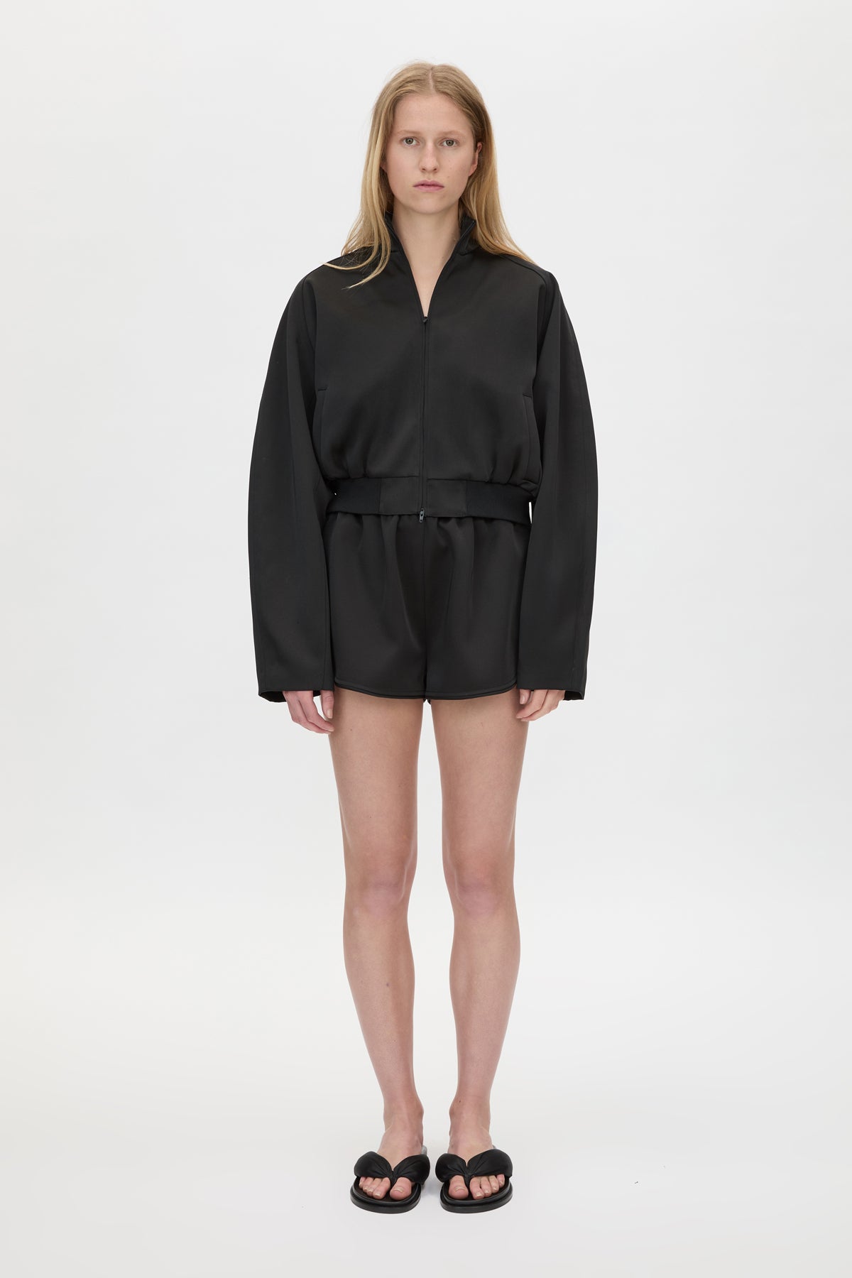 Front styled view CAMILLA AND MARC Tamar Mini Short in Black with relaxed fit and elasticated waistband.