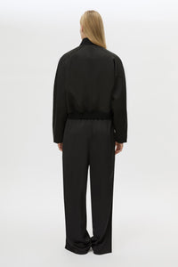 Back view CAMILLA AND MARC Tamar Satin Bomber Jacket in Black with front zipper.