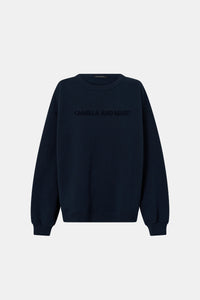 Ghost view CAMILLA AND MARC Tia Flocking Logo Crew in Deep Ink with relaxed fit, logo artwork and 100% cotton.