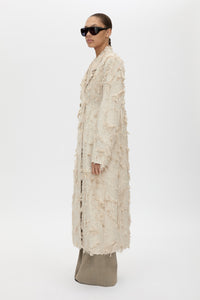 Side view CAMILLA AND MARC Tundra Double Breasted Coat in Stone with exaggerated shoulders, fitted waist and jacquard floral texture.