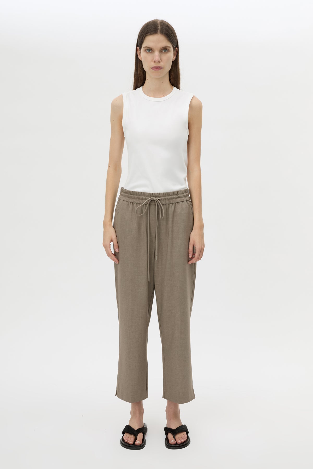 Front styled view CAMILLA AND MARC Vector Crop Pant in Mocha Brown with soft suiting fabrication.