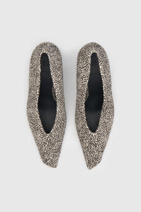 Top view CAMILLA AND MARC Wave Spotted Pump in Black and White with textured finish and angled heel.