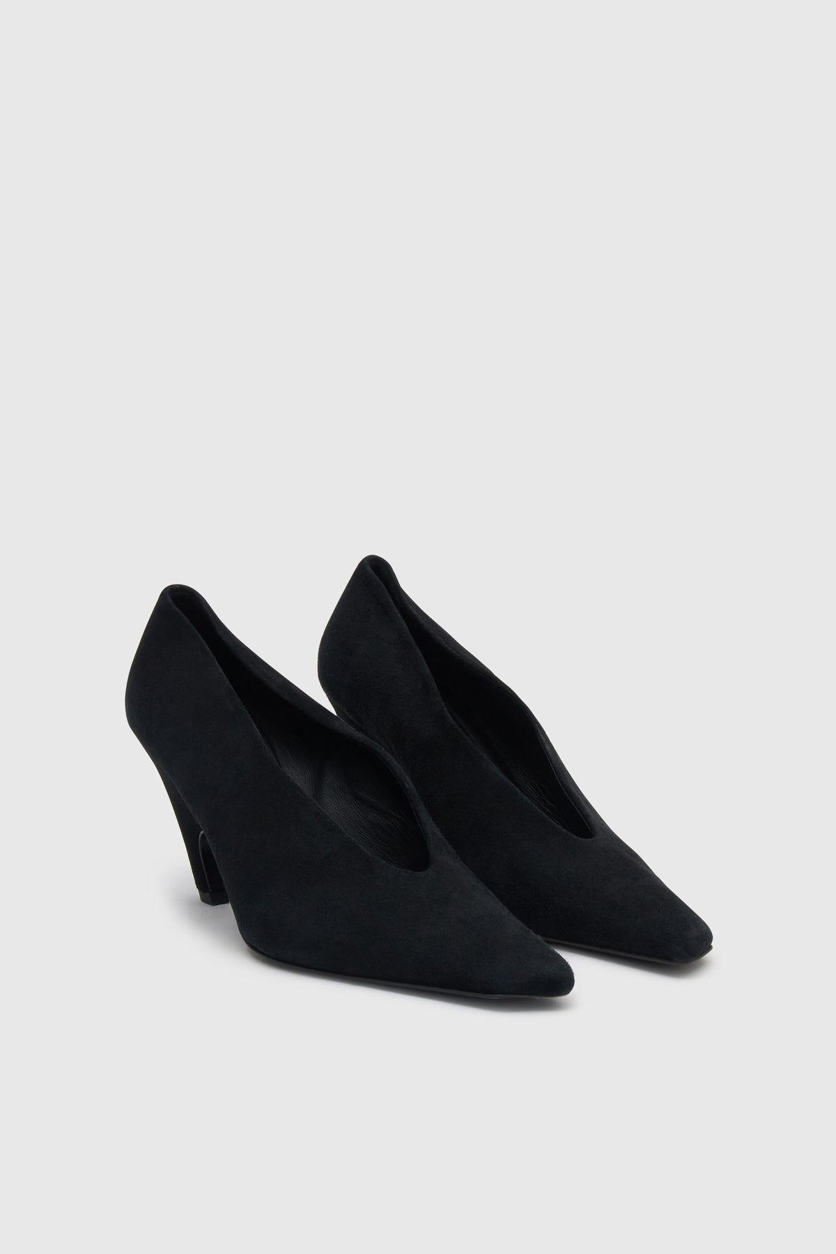 Three-quarter view CAMILLA AND MARC Wave Pump in Black suede with narrow square toe and angled heel.