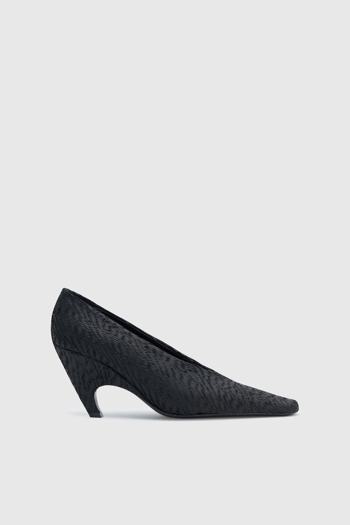 Side view CAMILLA AND MARC Wave Textured Pump in black laser‑cut goat leather.