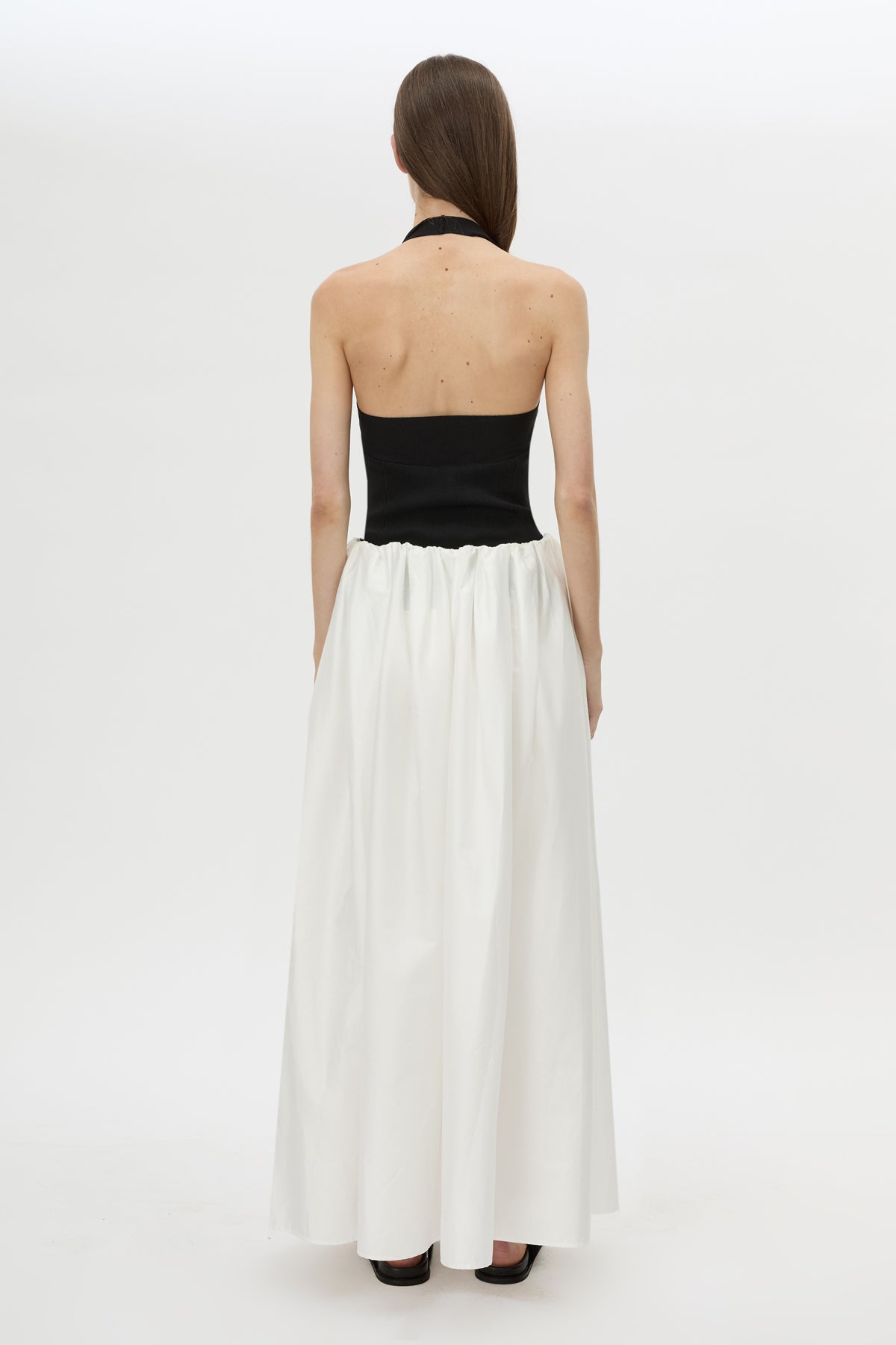 Back view CAMILLA AND MARC Zaya Maxi Skirt in Cream with gathered volume, and concealed elastic waistband.