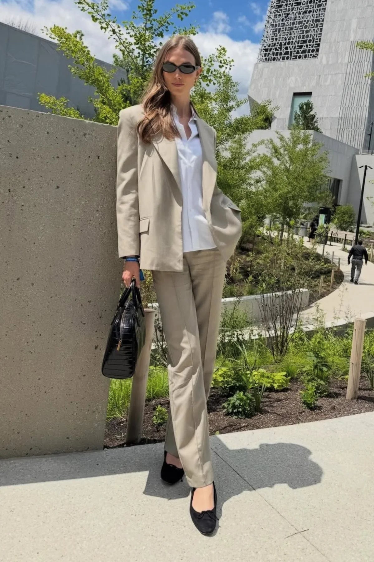 Karlie Kloss wears CAMILLA AND MARC Sei Blazer and Seri Pant from Autumn Winter 26. 