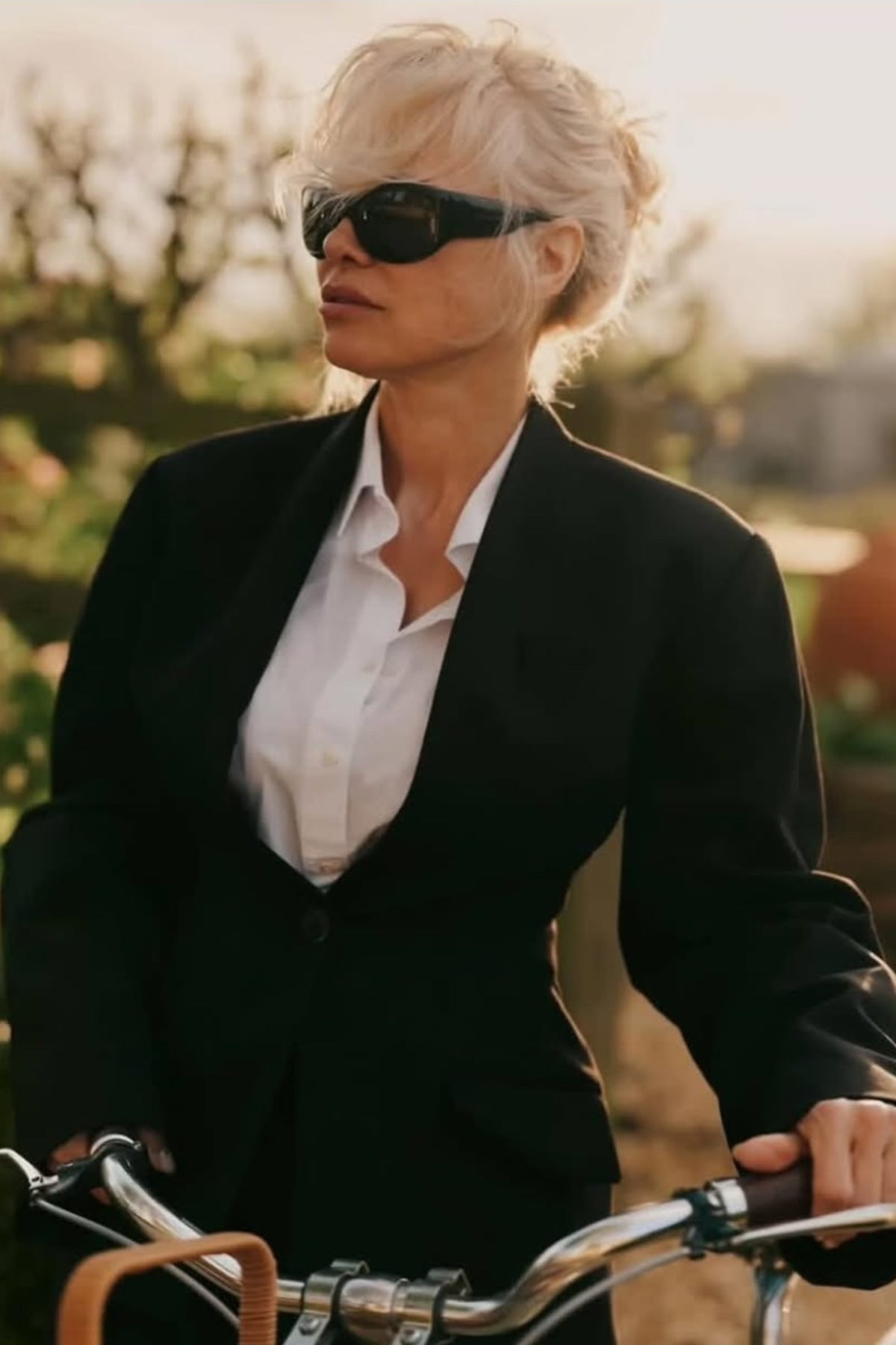 Pamela Anderson wears CAMILLA AND MARC Tala Fitted Blazer from Pre Fall 26.