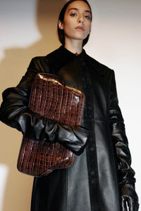 Campaign view CAMILLA AND MARC Mette Bag in brown croc embossed leather.