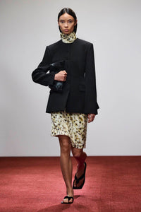 Runway view CAMILLA AND MARC Sentra Top in Sentra print with high‑neck cowl neckline.