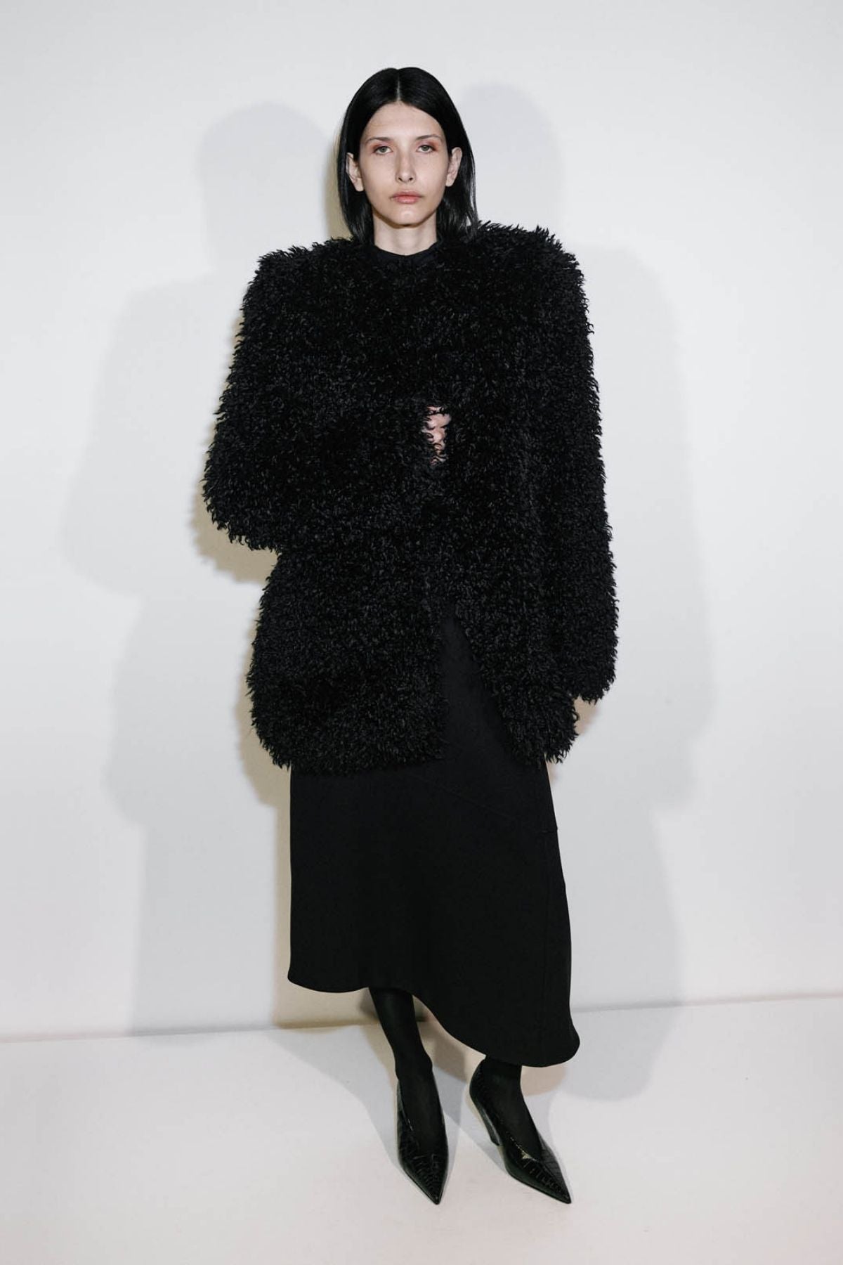 Campaign view CAMILLA AND MARC oversized Renley Short Coat in black faux‑fur.