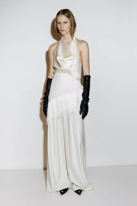 Campaign styled view CAMILLA AND MARC high-waisted Selin Pant in cream.