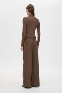Back view CAMILLA AND MARC Axial Top in Chocolate with layered cross‑over high neck.