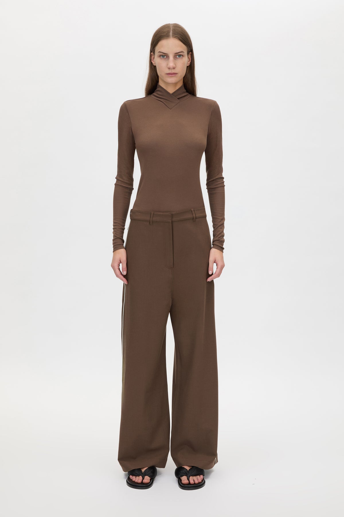 Front view CAMILLA AND MARC Axial Top in Chocolate with layered cross‑over high neck.