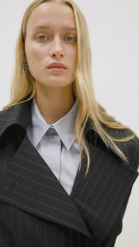 Styling video CAMILLA AND MARC Jurien Cage Earrings in Silver with rhodium‑plated oval cage design.