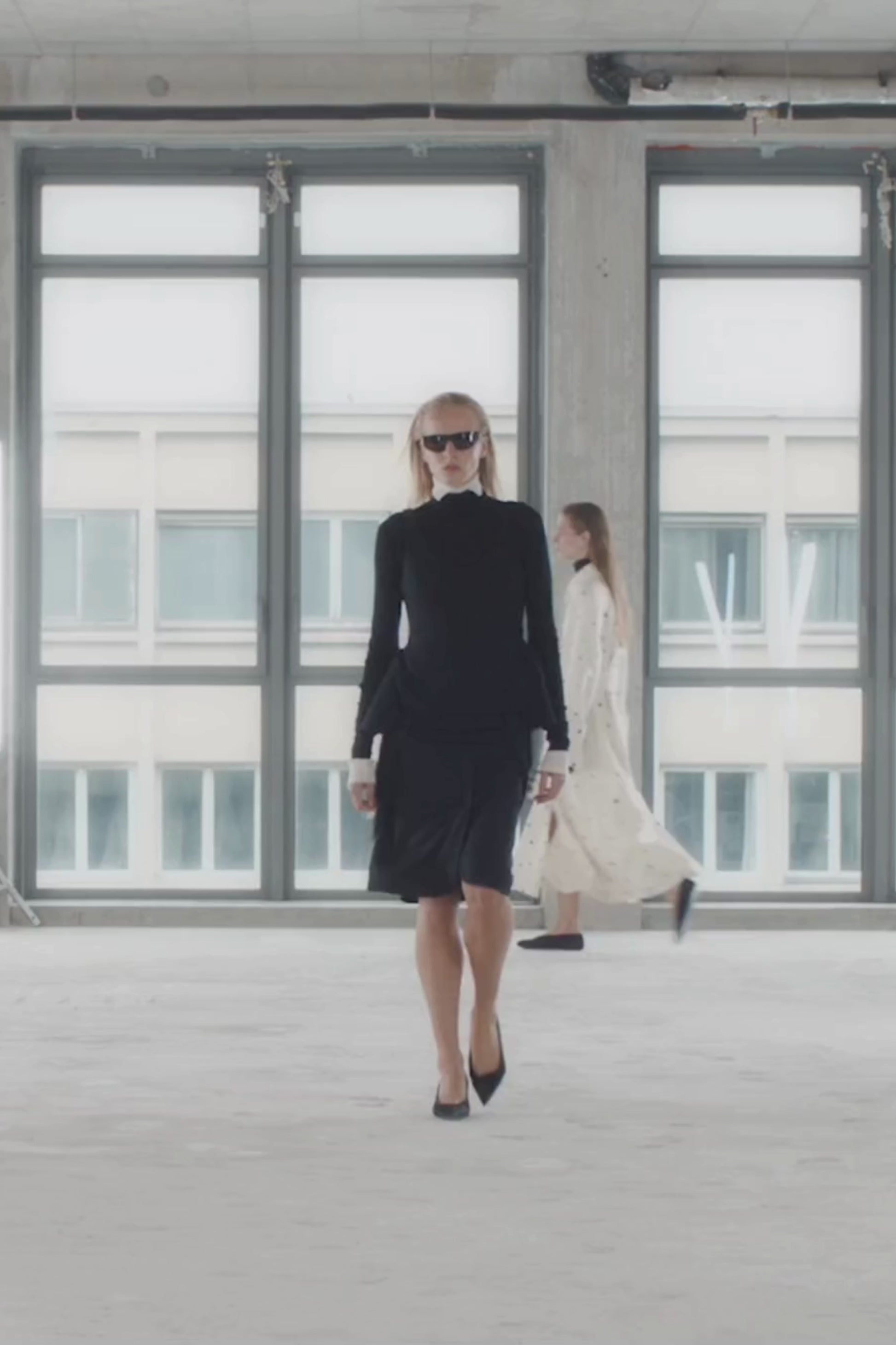 Runway video CAMILLA AND MARC Zaman Top in Black with a structured sleeveless design and detachable hem fringe.