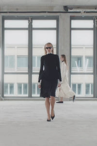 Runway video CAMILLA AND MARC Zaman Top in Black with a structured sleeveless design and detachable hem fringe.