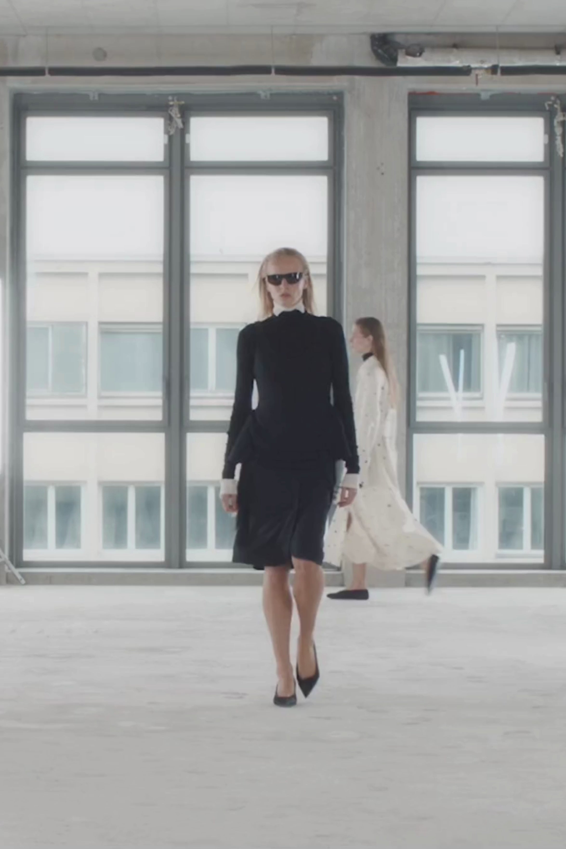 Runway video CAMILLA AND MARC Zaman Top in Black with a structured sleeveless design and detachable hem fringe.